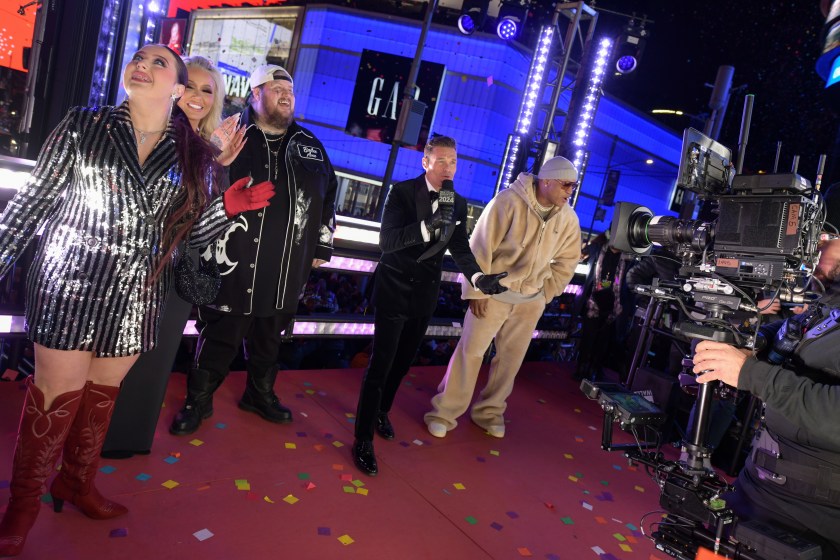 Guest, Bunnie Xo, Jelly Roll, Ryan Seacrest and LL Cool J celebrate onstage during Dick Clark's New Year's Rockin' Eve with Ryan Seacrest 2024 in Times Square on December 31, 2023 in New York, New York. 