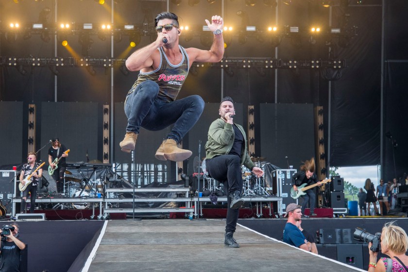BROOKLYN, MI - JULY 22: Dan Smyers (L) and Shay Mooney of Dan + Shay perform during day 2 of Faster Horses Festival at Michigan International Speedway on July 22, 2017 in Brooklyn, Michigan. 