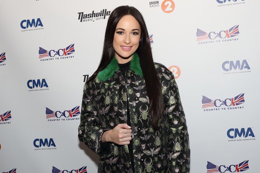 LONDON, ENGLAND - MARCH 10: Kacey Musgraves wearing Red Valentino coat poses during a photocall on day 2 of C2C Country to Country festival at The O2 Arena on March 10, 2018 in London, England.