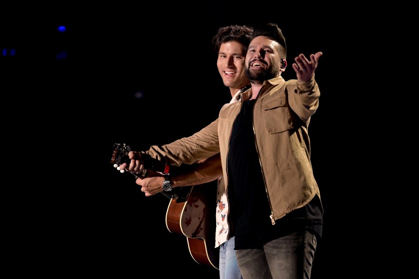 NASHVILLE, TN - JUNE 07: (EDITORIAL USE ONLY) Dan Smyers (L) and Shay Mooney (R) of musical duo Dan + Shay perform onstage during the 2018 CMA Music festival at the Nissan Stadium on June 7, 2018 in Nashville, Tennessee.