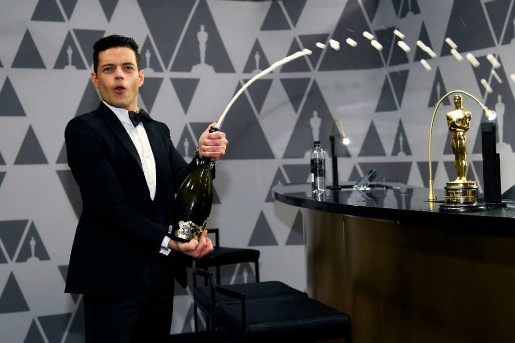 Rami Malek sprays champagne during the 91st Annual Academy Awards Governors Ball