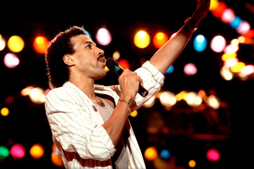 Lionel Richie performing on stage at Live Aid at Veteran's Stadium in Philadelphia, Pennsylvania, July 13, 1985.