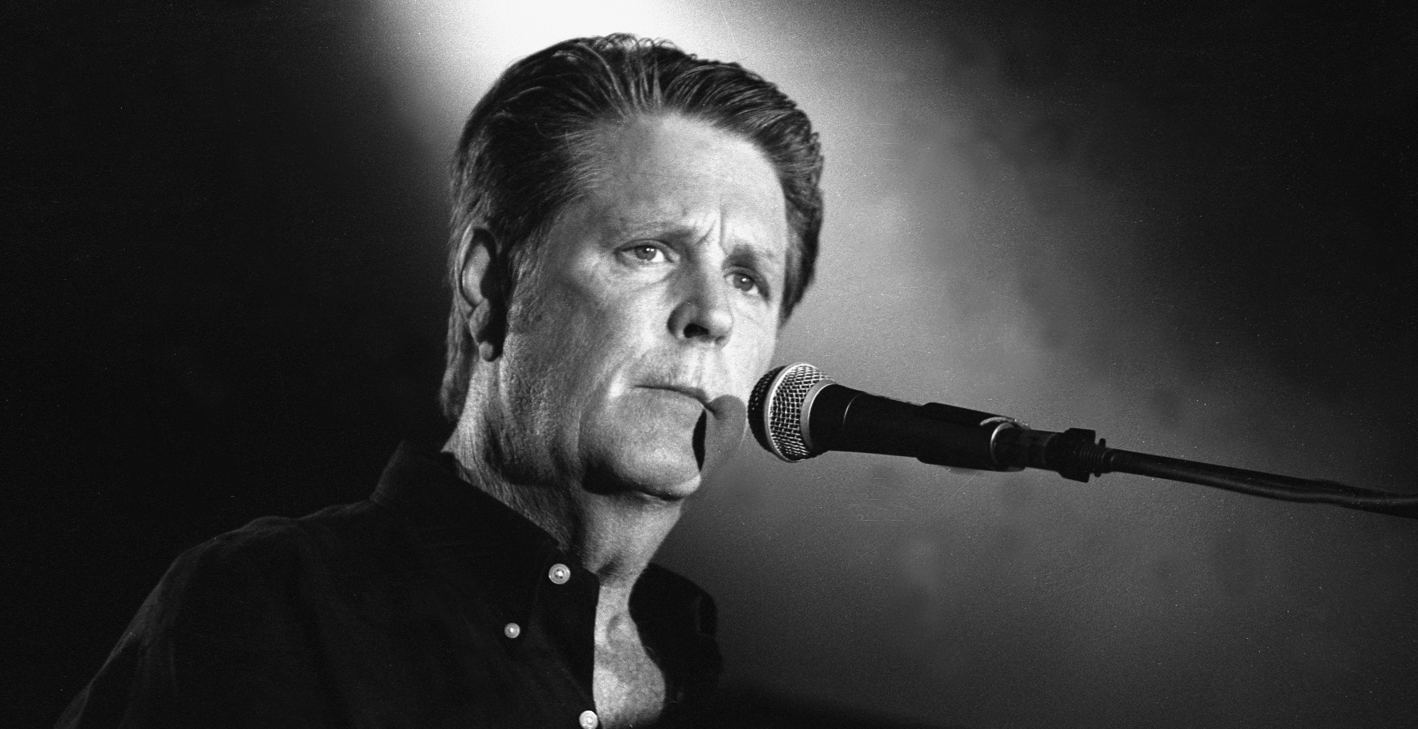 Grammy Award winning musician Brian Wilson, best known as the leader and chief songwriter of the Beach Boys, is shown performing on stage during a "live" concert appearance.