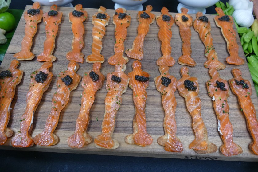 08 March 2023, USA, Los Angeles: Salmon snacks in the shape of the Oscar trophy from the kitchen of star chef Wolfgang Puck. This is the 29th time he has served up salmon for the celebrity guests after the Oscar gala - and this time, too, he has made provisions for the big appetite. 