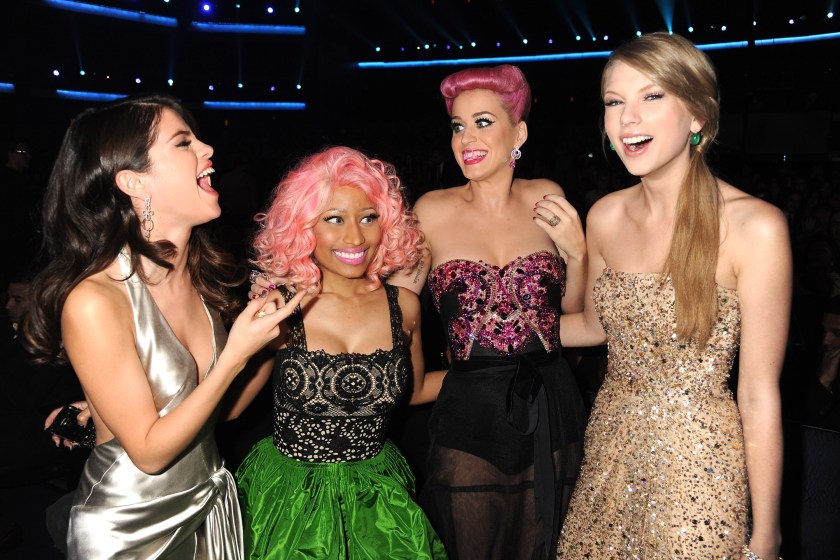 LOS ANGELES, CA - NOVEMBER 20: Selena Gomez, Nicki Minaj, Katy Perry and Taylor Swift in the audience at the 2011 American Music Awards at the Nokia Theatre L.A. LIVE on November 20, 2011 in Los Angeles, California.