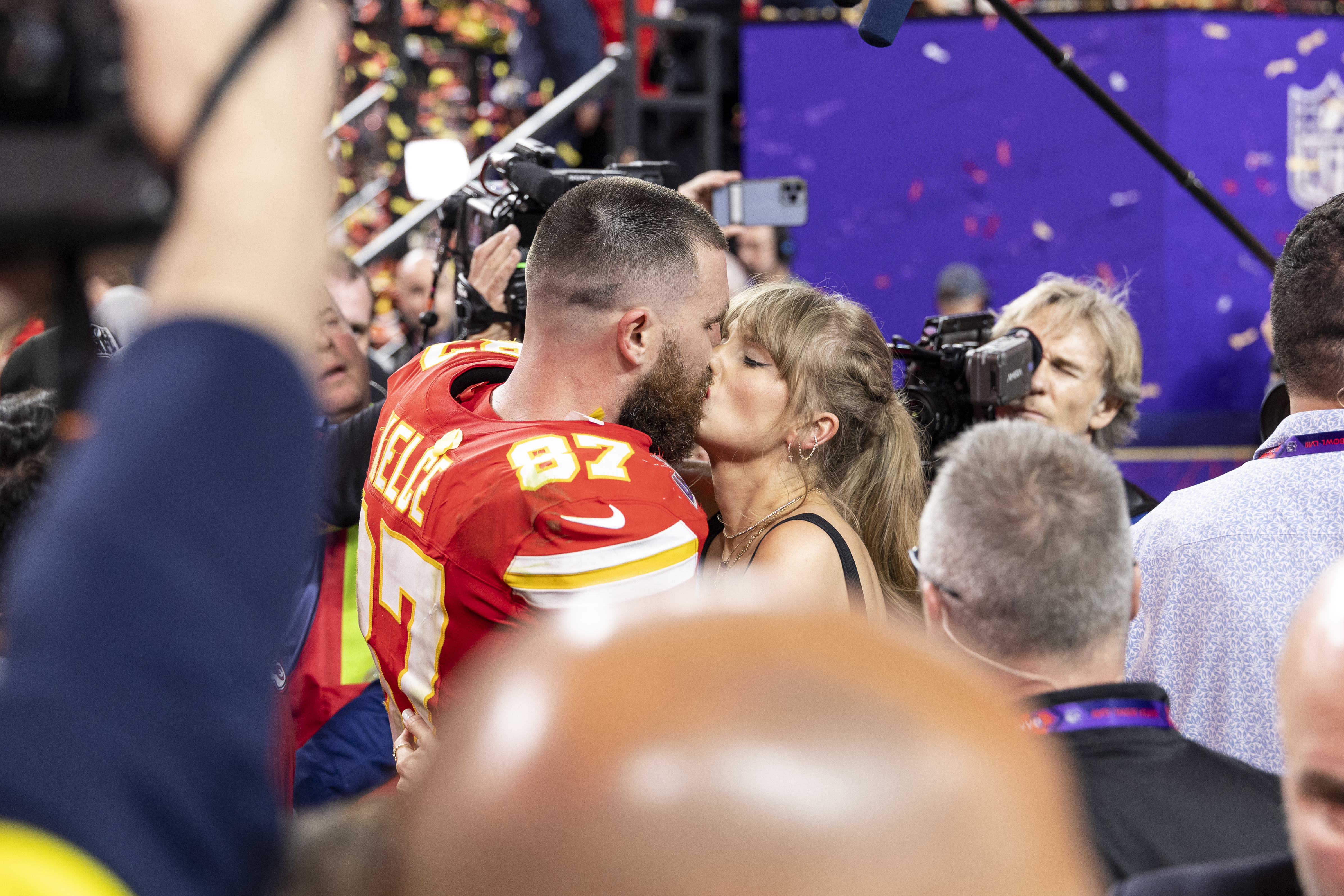 LAS VEGAS, NEVADA - FEBRUARY 11: Travis Kelce #87 of the Kansas City Chiefs celebrates and kisses Singer Taylor Swift following the NFL Super Bowl 58 football game between the San Francisco 49ers and the Kansas City Chiefs at Allegiant Stadium on February 11, 2024 in Las Vegas, Nevada.
