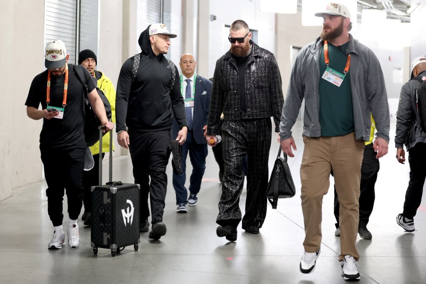 LAS VEGAS, NEVADA - FEBRUARY 11: Patrick Mahomes #15 of the Kansas City Chiefs and Travis Kelce #87 walk through the tunnel as they leave the stadium after defeating the San Francisco 49ers 25-22 in overtime during Super Bowl LVIII at Allegiant Stadium on February 11, 2024 in Las Vegas, Nevada.