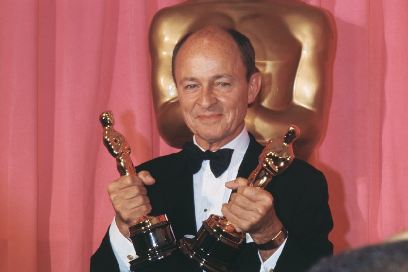 (Original Caption) Los Angeles, California: Producer Frank McCarthy holds two Oscars, one for Patton, which was named best picture and one for the absent George C. Scott, who won best actor in title role of Patton, during Academy Awards Ceremonies here.
