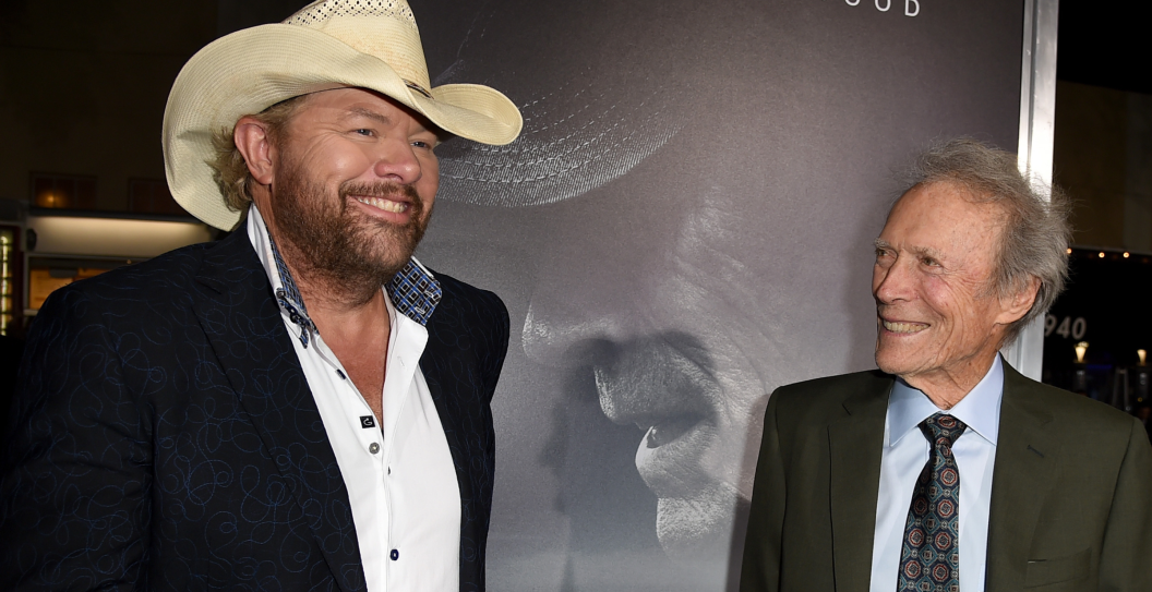 Toby Keith (L) and Clint Eastwood arrive at the premiere of Warner Bros. Pictures' "The Mule" at the Village Theatre on December 10, 2018 in Los Angeles, California.