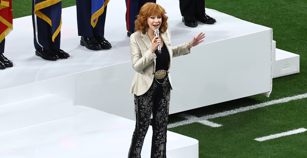 : Singer Reba McEntire performs the national anthem prior to Super Bowl LVIII between the San Francisco 49ers and Kansas City Chiefs at Allegiant Stadium on February 11, 2024 in Las Vegas, Nevada.