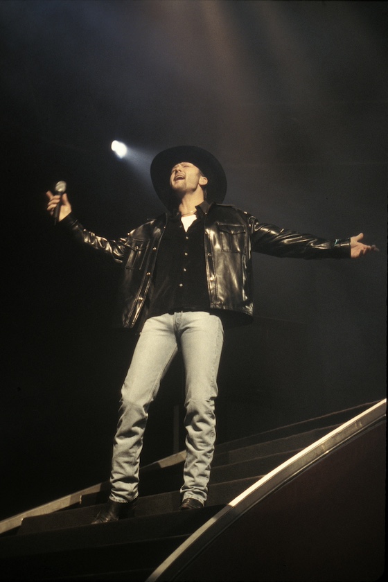 Singer Tim McGraw is shown performing on stage during a "live" concert appearance on November 10, 2002. 