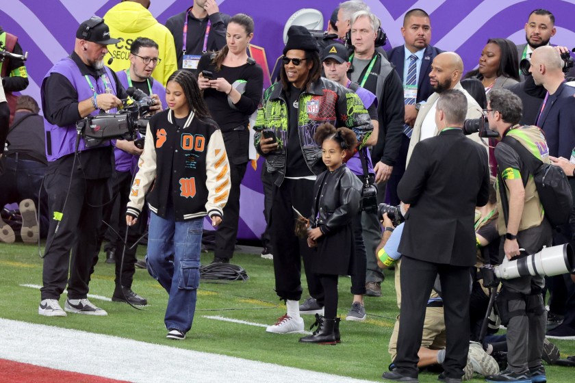 LAS VEGAS, NEVADA - FEBRUARY 11: (L-R) Blue Ivy Carter, Jay-Z and Rumi Carter are seen prior to Super Bowl LVIII at Allegiant Stadium on February 11, 2024 in Las Vegas, Nevada.