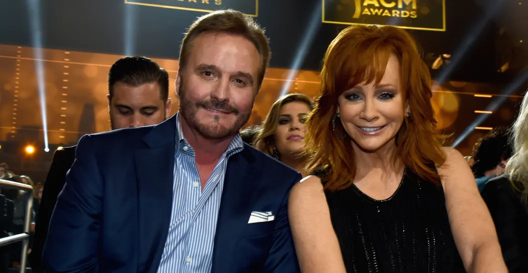 ARLINGTON, TX - APRIL 19: TV producer Narvel Blackstock (L) and singer Reba McEntire during the 50th Academy Of Country Music Awards at AT&T Stadium on April 19, 2015 in Arlington, Texas.