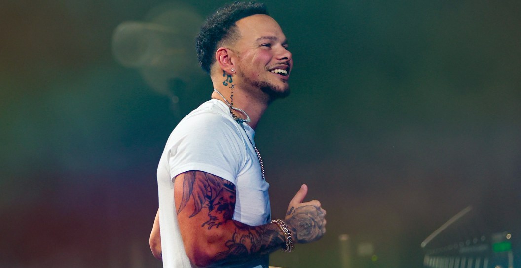 Kane Brown Does His Best Luke Bryan Impression By Falling Onstage During Concert