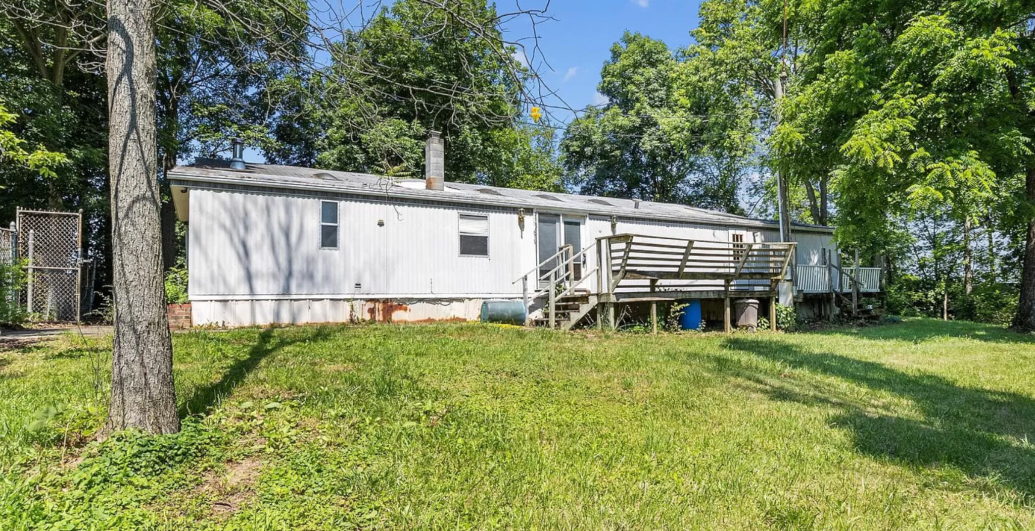 Would You Buy This Double-Wide Trailer With Indoor Pool? Take A Look ...