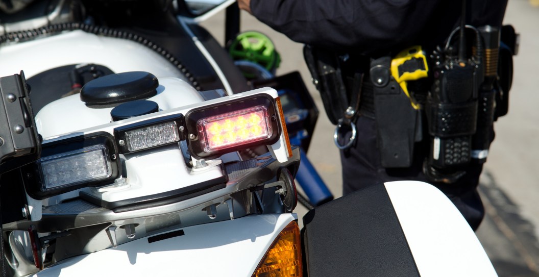 Motorcycle Cop Loses Hand After Plowing Into Crowd At Christmas Parade