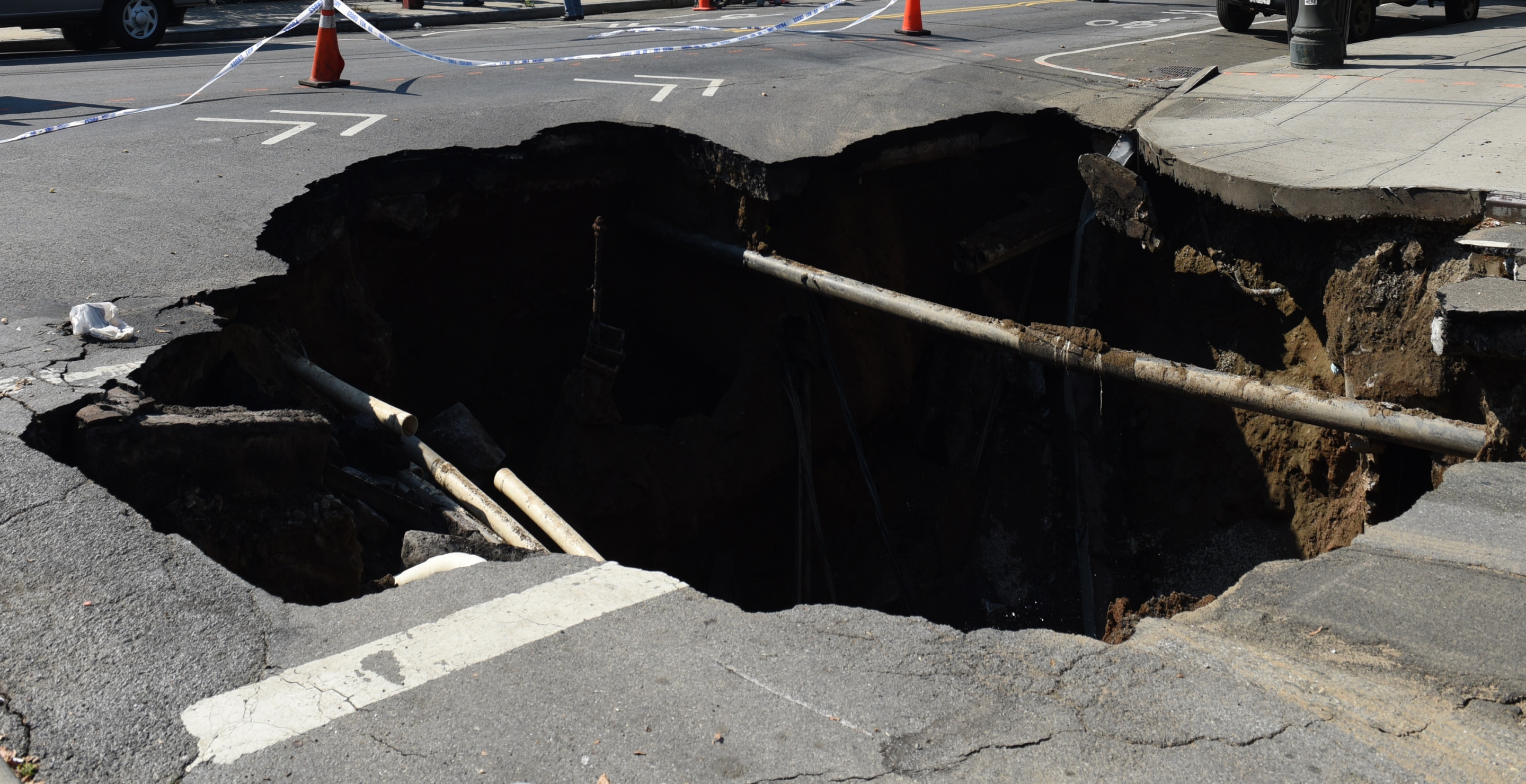 How A Garbage Truck Falling Into A Sinkhole Caused A Neighborhood To Lose Power