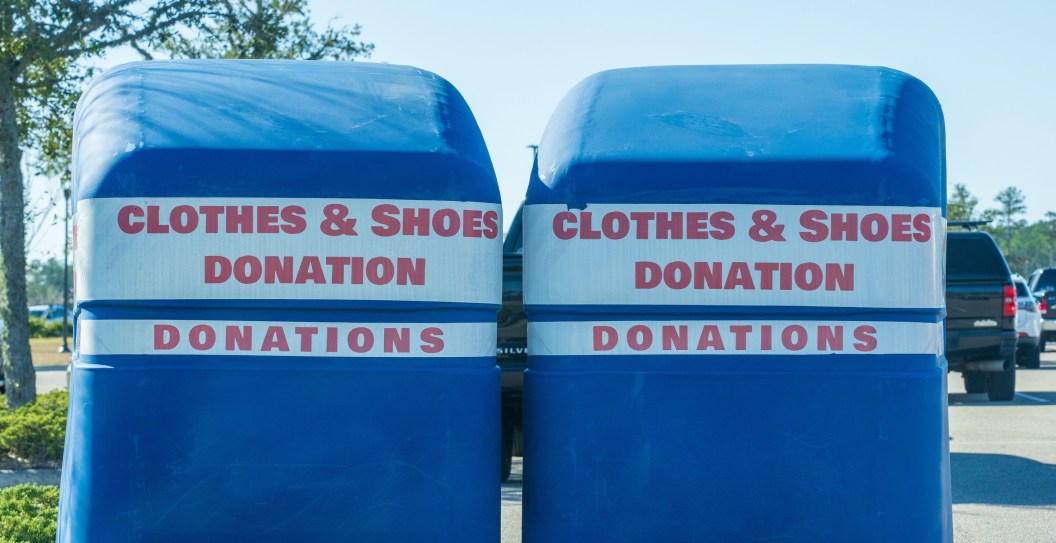 Woman Found Dead Inside Burning Clothes Donation Box, Sparking Investigation