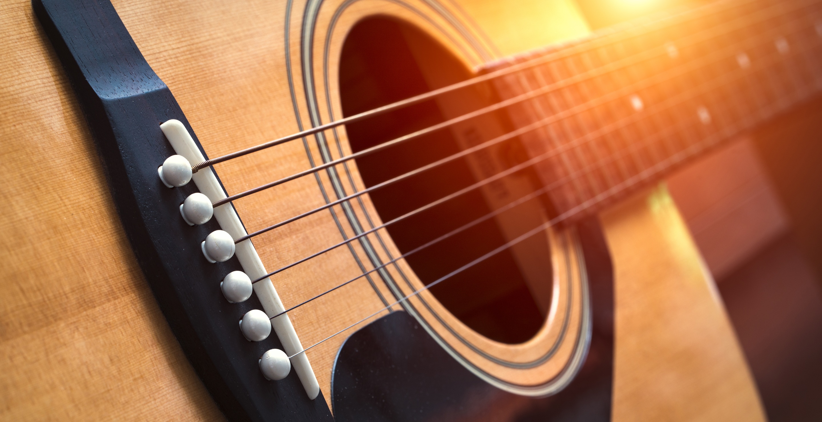 detail of classic guitar with shallow depth of field