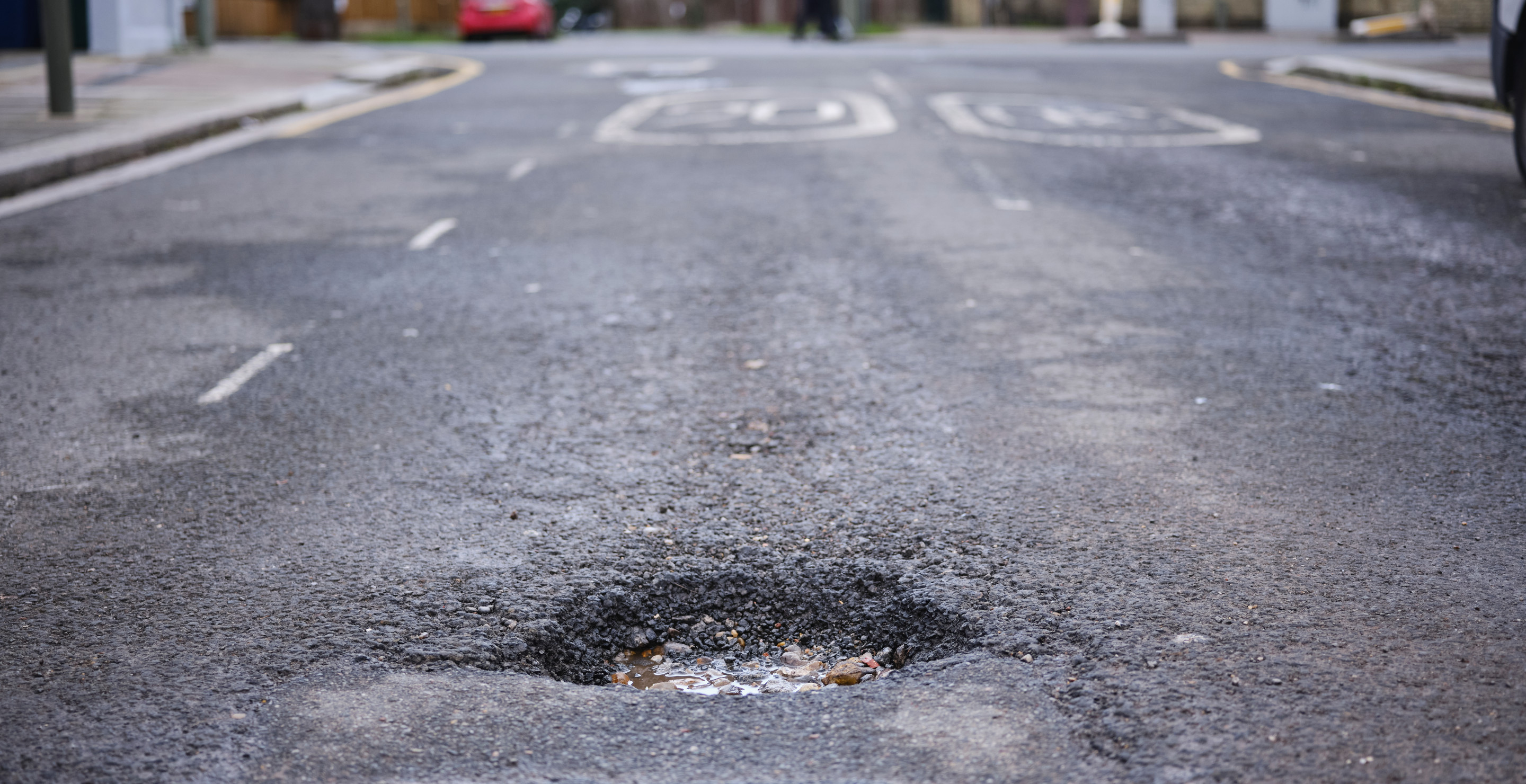 Father of Two Killed in Freak Accident Involving Pot Hole