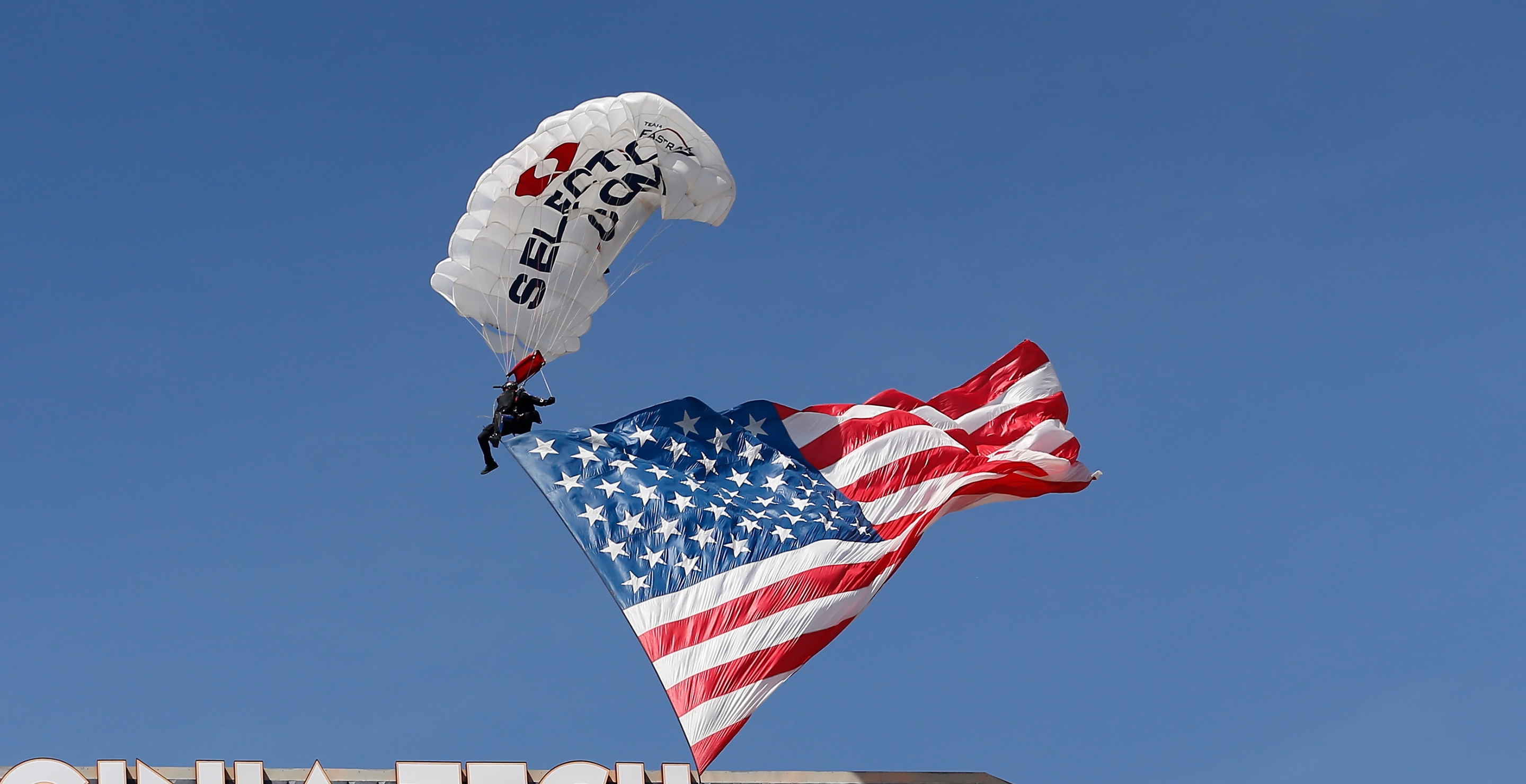 Parachutist Left Dangling From Jumbotron After Football Game Stadium Crash in Virginia