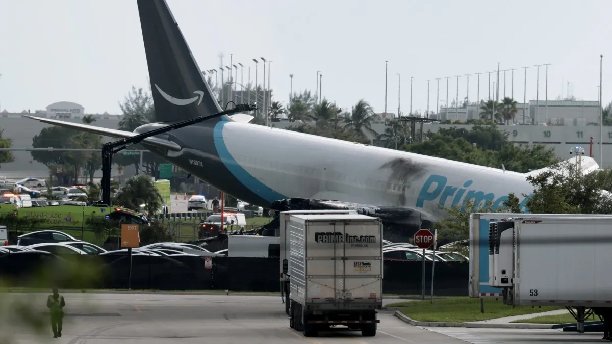 MIAMI, FLORIDA - SEPTEMBER 06: An Amazon cargo plane is seen after it crashed at Miami International Airport on September 06, 2026 in Miami, Florida. In a statement, the Federal Aviation Administration said Prime Air Flight 7598 overran the runway while landing around 2 p.m. after departing from Luis Muñoz Marín International Airport in San Juan, Puerto Rico, earlier today. (Photo by Joe Raedle/Getty Images)
