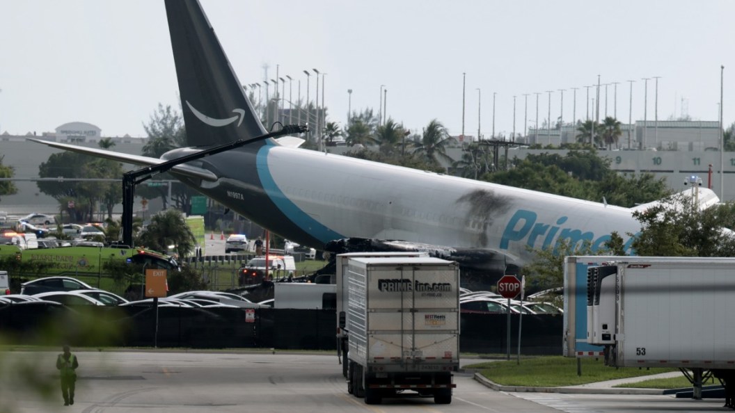 MIAMI, FLORIDA - SEPTEMBER 06: An Amazon cargo plane is seen after it crashed at Miami International Airport on September 06, 2026 in Miami, Florida. In a statement, the Federal Aviation Administration said Prime Air Flight 7598 overran the runway while landing around 2 p.m. after departing from Luis Muñoz Marín International Airport in San Juan, Puerto Rico, earlier today. (Photo by Joe Raedle/Getty Images)