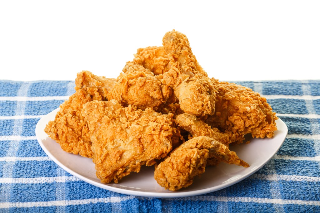 Golden Fried Chicken on Plate and Placemat
