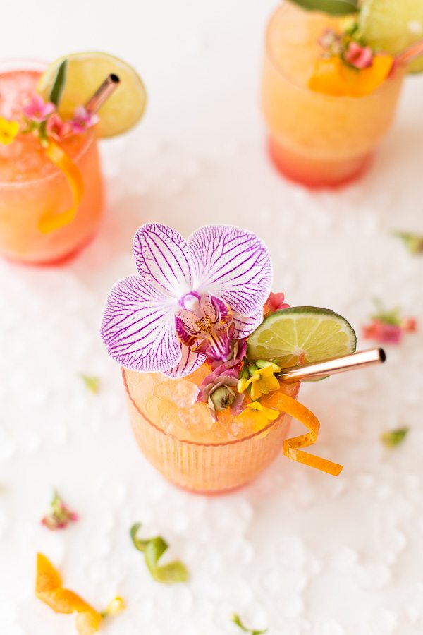 Rum punch in a cocktail with a flower