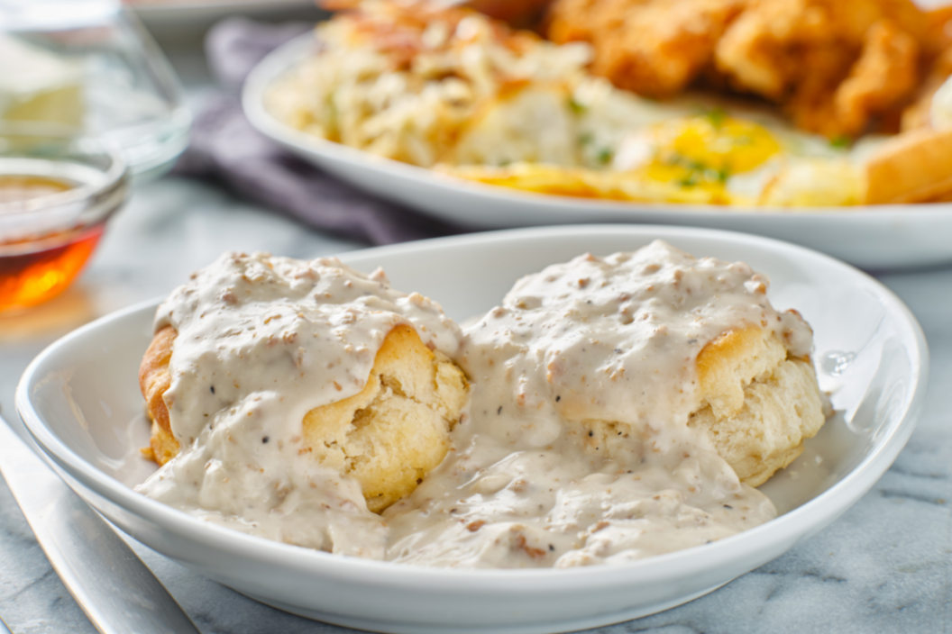 https://www.wideopencountry.com/wp-content/uploads/sites/4/eats/2020/07/pioneer-woman-biscuits-and-gravy.png?fit=1056%2C704