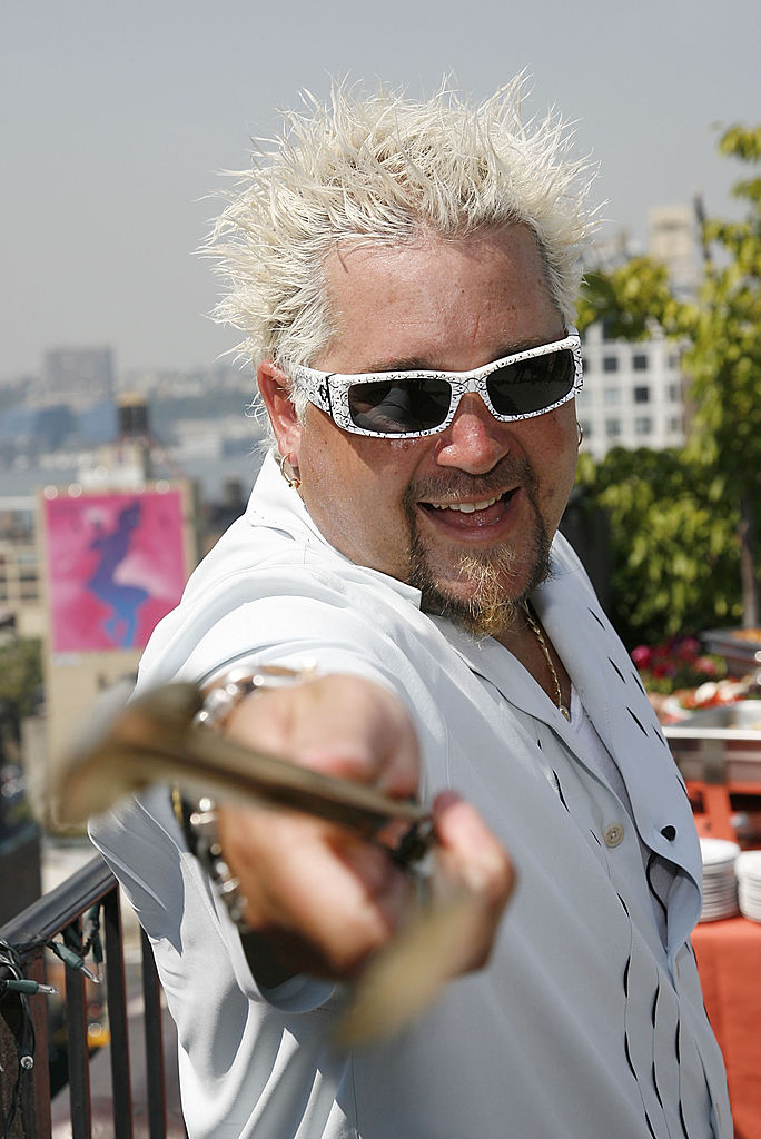 NEW YORK - SEPTEMBER 04:  Guy Fieri poses at the Bring it t-ON-g Grilling Challenge at Penthouse 15 on September 4, 2008 in New York City.  