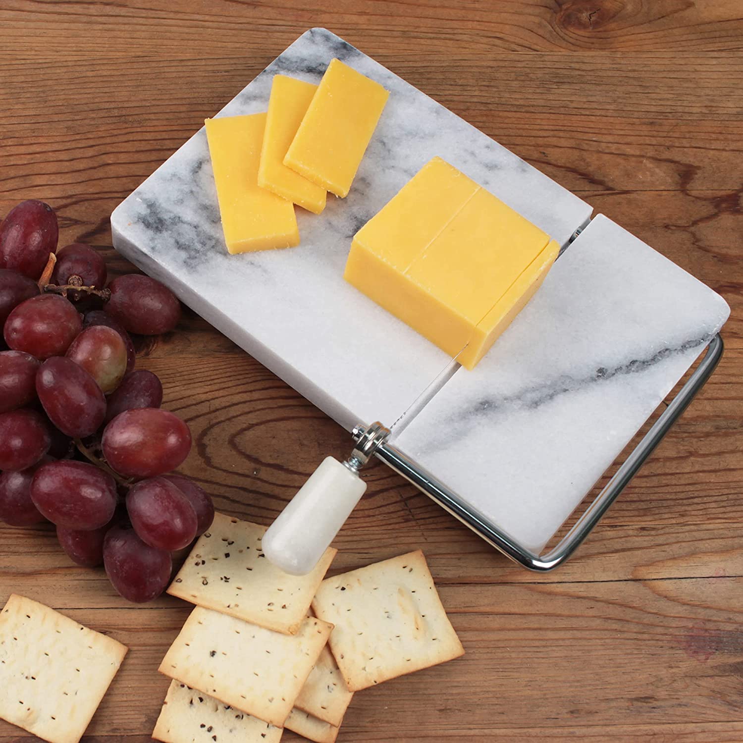 RSVP International White Marble Cheese Slicer & Cutting Board, 5 x 8 | Cut Cheeses, Meats, & Other Appetizers | Each Piece Unique in Marble Coloring | Stainless Steel Wire Cheese Slicer