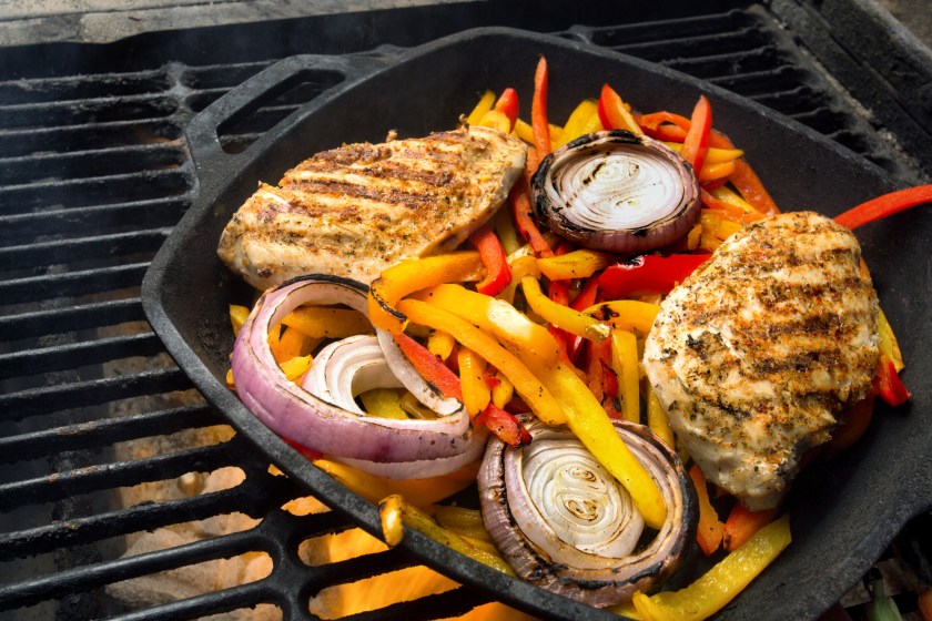 Chicken Fajitas on a Charcoal Grill with Flames