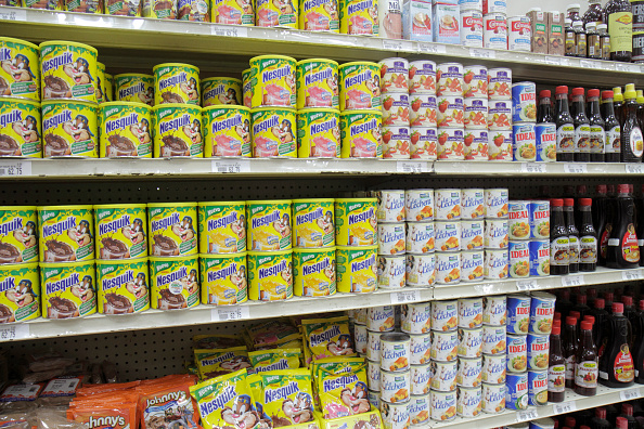 Shelves of chocolate milk powder for sale at La Colonia Supermarket. 