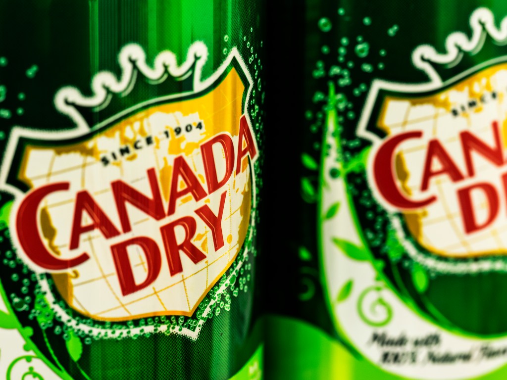 Cans of Canada Dry Ginger Ale. John J. McLaughlin formulated