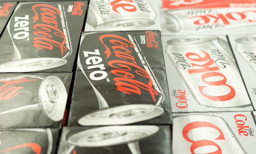 Coca Cola Zero and Coca Cola Diet can boxes in a store, Coca