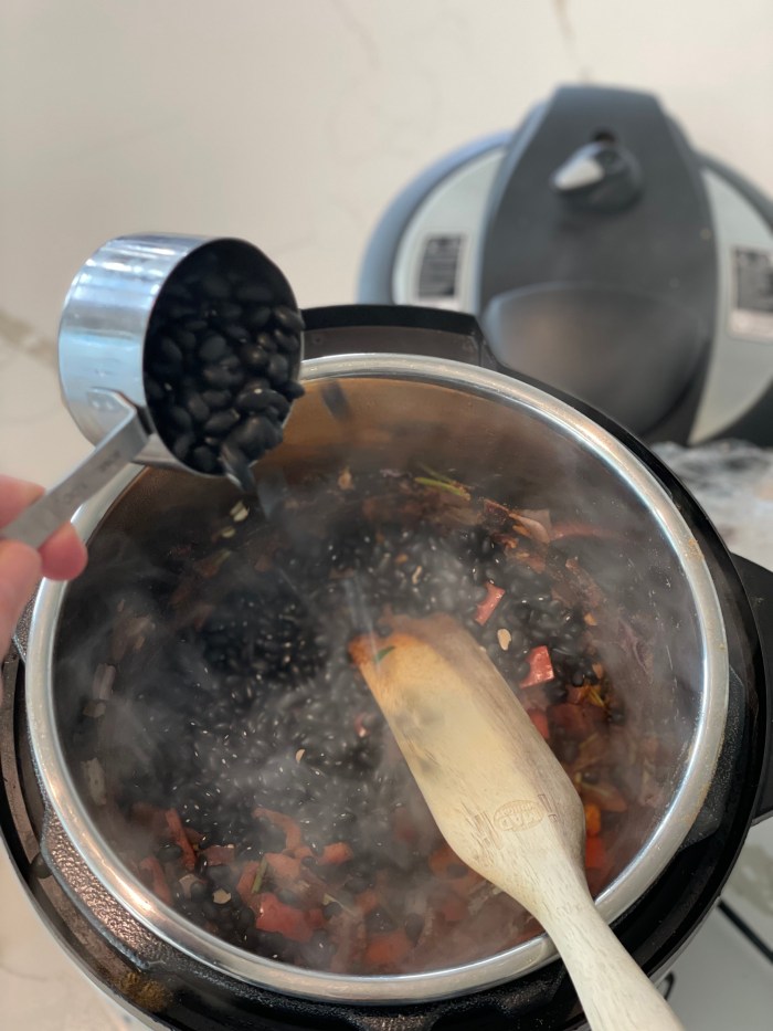 adding black beans to soup