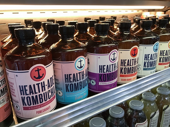 Bottles of commercial Kombucha are seen displayed