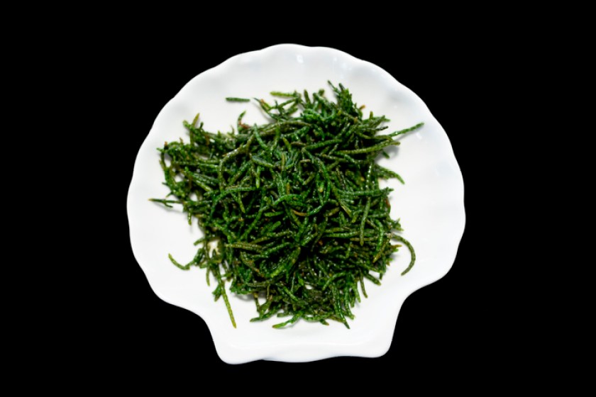 Sea beans glasswort pickleweed or Salicornia Salad on plate