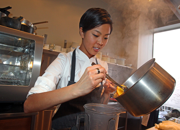 Top Chef Kristen Kish prepares some orange puree