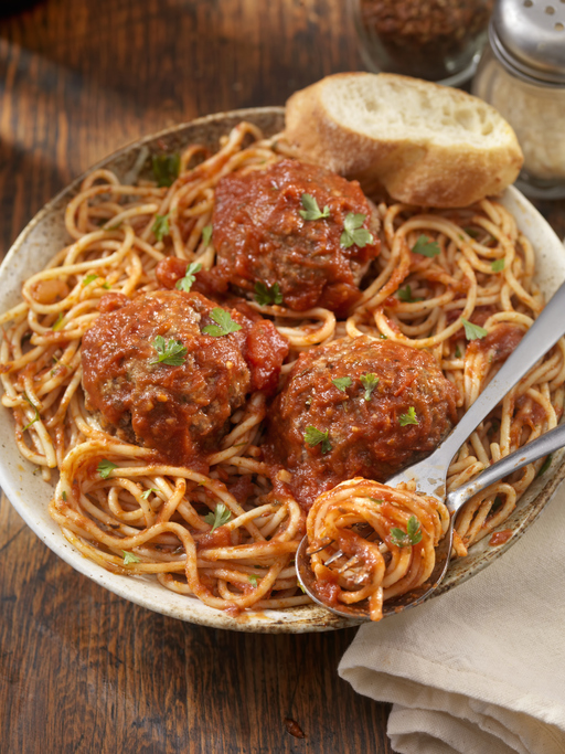 Spaghetti with Large Meatballs in a Tomato Basil Sauce with fresh Bread 